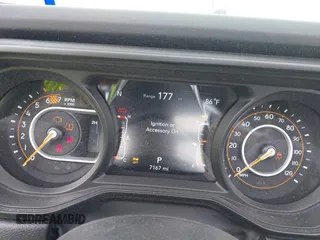 2025 Jeep Wrangler Sahara with VIN 1C4PJXEN1SW528297, listed as a IAAI auction lot 42131265 with 7,167 mi miles and . Bid and sale history available at DreamBid. Image 7.