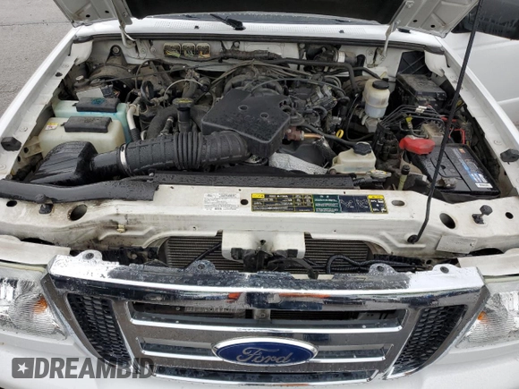 2011 Ford Ranger XLT with VIN 1FTLR4EEXBPA89648, listed as a Copart auction lot 54789615 with 106,630 mi miles and Salvage title. Bid and sale history available at DreamBid. Image 11.
