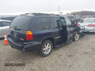 2007 GMC Envoy SLE with VIN 1GKDT13S372158038, listed as a IAAI auction lot 42103078 with 119,954 mi miles. Bid and sale history available at carsss.com. Image 4.