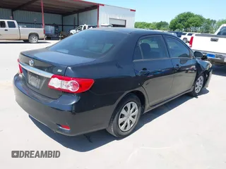 2011 Toyota Corolla L with VIN JTDBU4EE9BJ096586, listed as a IAAI auction lot 41992120 with 201,297 mi miles. Bid and sale history available at carsss.com. Image 4.