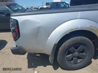 2011 Nissan Frontier PRO-4X with VIN 1N6AD0EVXBC407089, listed as a IAAI auction lot 42113537 with 124,853 mi miles. Bid and sale history available at carsss.com. Image 6.