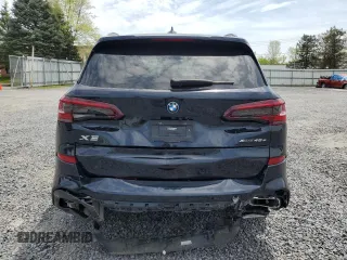 2023 BMW X5 xDrive45e z VIN 5UXTA6C01P9R61137, wystawiony jako Copart lot #56458155 z przebiegiem 27 501 mil mil oraz Szkoda całkowita • Salvage title. Historia ofert i sprzedaży dostępna na DreamBid. Obrazek 6.