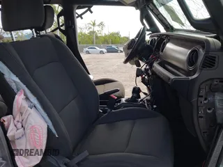 2018 Jeep Wrangler Unlimited Sport S с VIN 1C4HJXDG7JW170077, выставлен на аукционе IAAI как лот 42019911 с пробегом Не указан миль и . История ставок и продаж доступна на DreamBid. Изображение 5.