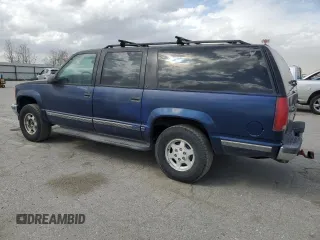 1997 Chevrolet Suburban z VIN 1GNFK16R9VJ309720, wystawiony jako Copart lot #48814475 z przebiegiem 198 109 mil mil oraz Czysty tytuł • Clean title. Historia ofert i sprzedaży dostępna na DreamBid. Obrazek 2.