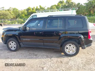 2014 Jeep Patriot Sport with VIN 1C4NJPBA3ED720412, listed as a IAAI auction lot 42390785 with 215,446 mi miles and . Bid and sale history available at DreamBid. Image 14.