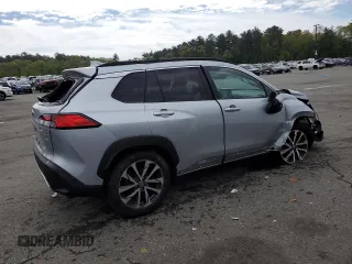 2022 Toyota Corolla Cross XLE with VIN 7MUDAABG2NV009663, listed as a Copart auction lot 55945735 with 59,473 mi miles and Salvage title. Bid and sale history available at DreamBid. Image 3.
