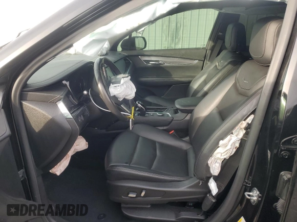 2021 Cadillac XT6 Luxury with VIN 1GYKPAR46MZ235367, listed as a Copart auction lot 84516834 with 73,448 mi miles and Salvage title. Bid and sale history available at DreamBid. Image 7.
