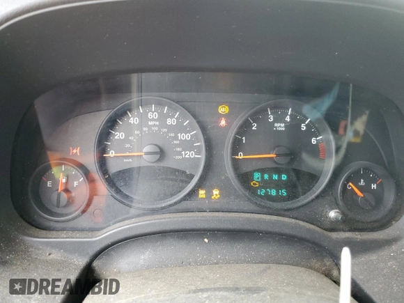 2009 Jeep Patriot Sport z VIN 1J4FT28A49D122175, wystawiony jako Copart lot #51518055 z przebiegiem 127 815 mil mil oraz Szkoda całkowita • Salvage title. Historia ofert i sprzedaży dostępna na DreamBid. Obrazek 9.