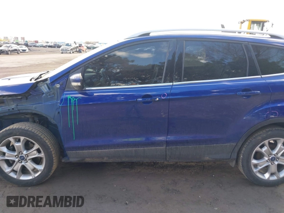 2016 Ford Escape Titanium with VIN 1FMCU9JX5GUA96563, listed as a IAAI auction lot 41695524 with 76,992 mi miles. Bid and sale history available at carsss.com. Image 15.