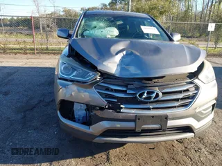 2018 Hyundai Santa Fe 2.4L z VIN 5NMZTDLB8JH098926, wystawiony jako IAAI lot #41816513 z przebiegiem 92 920 mil mil oraz . Historia ofert i sprzedaży dostępna na DreamBid. Obrazek 6.