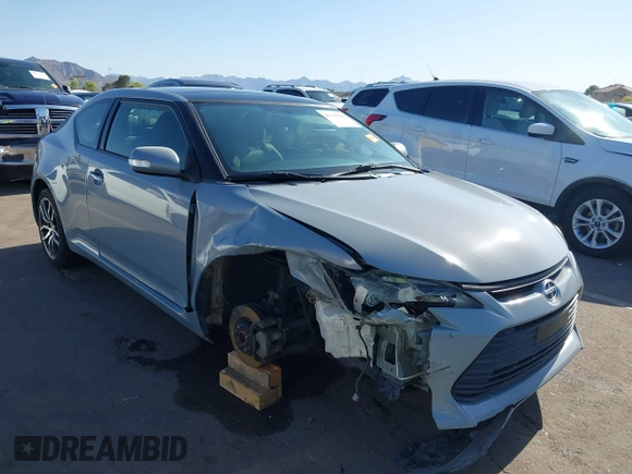 2015 Scion tC with VIN JTKJF5C7XFJ012872, listed as a IAAI auction lot 42128621 with 100,832 mi miles. Bid and sale history available at carsss.com. Image 6.