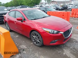2018 Mazda 3 Touring with VIN 3MZBN1V3XJM159106, listed as a IAAI auction lot 42127018 with 79,189 mi miles. Bid and sale history available at carsss.com. Image 1.
