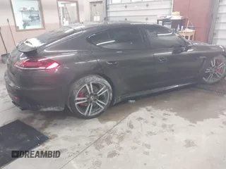 2014 Porsche Panamera GTS with VIN WP0AF2A73EL083133, listed as a IAAI auction lot 41945656 with 75,701 mi miles and . Bid and sale history available at DreamBid. Image 4.