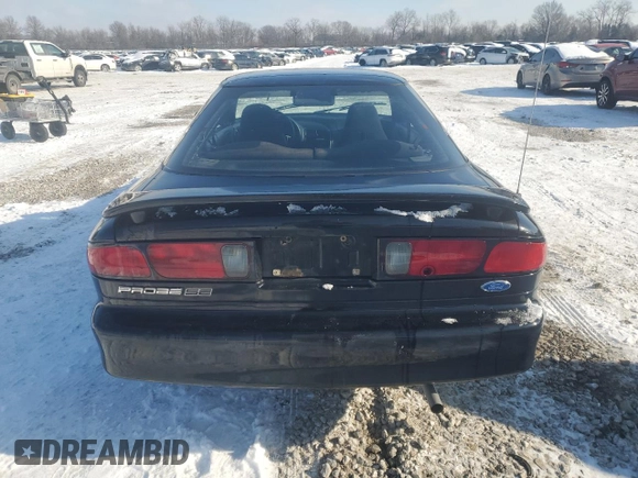1996 Ford Probe z VIN 1ZVLT20A6T5129311, wystawiony jako Copart lot #87306604 z przebiegiem 117 729 mil mil oraz Tytuł czysty. Historia ofert i sprzedaży dostępna na DreamBid. Obrazek 6.