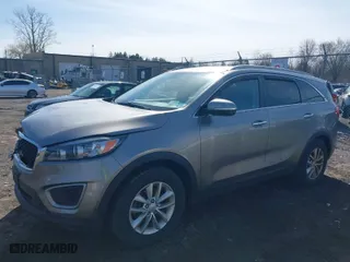 2017 Kia Sorento LX with VIN 5XYPGDA3XHG244089, listed as a IAAI auction lot 41956816 with 79,015 mi miles. Bid and sale history available at carsss.com. Image 2.