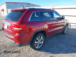 2013 Jeep Grand Cherokee Laredo with VIN 1C4RJEAG6DC636780, listed as a IAAI auction lot 41127701 with 135,026 mi miles. Bid and sale history available at carsss.com. Image 4.