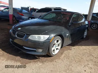 2013 BMW 3 Series 335i with VIN WBADX7C57DJ590238, listed as a IAAI auction lot 41920557 with 160,946 mi miles and . Bid and sale history available at DreamBid. Image 2.