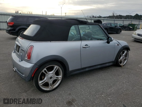 2005 MINI Convertible S with VIN WMWRH33575TK56034, listed as a Copart auction lot 88043565 with 33,410 mi miles and Salvage title. Bid and sale history available at DreamBid. Image 3.