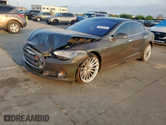 2013 Tesla Model S with VIN 5YJSA1CG0DFP15615, listed as a Copart auction lot 50795235 with 156,030 mi miles and Salvage title. Bid and sale history available at DreamBid. Image 1.