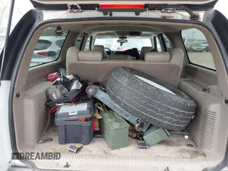 2004 GMC Yukon XL SLT with VIN 3GKEC16Z34G162090, listed as a IAAI auction lot 41600676 with 184,765 mi miles. Bid and sale history available at carsss.com. Image 8.