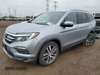 2018 Honda Pilot Touring z VIN 5FNYF6H94JB039992, wystawiony jako Copart lot #57128435 z przebiegiem 85 578 mil mil oraz Szkoda całkowita • Salvage title. Historia ofert i sprzedaży dostępna na DreamBid. Obrazek 1.
