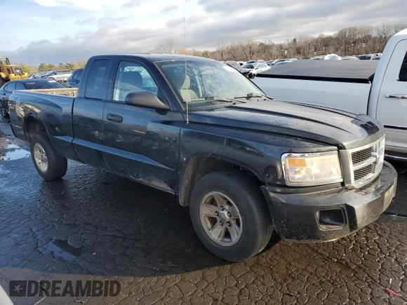 2011 Dodge Dakota z VIN 1D7RW2BK3BS602758, wystawiony jako Copart lot #85288074 z przebiegiem 138 473 mil mil oraz Szkoda całkowita • Salvage title. Historia ofert i sprzedaży dostępna na DreamBid. Obrazek 4.