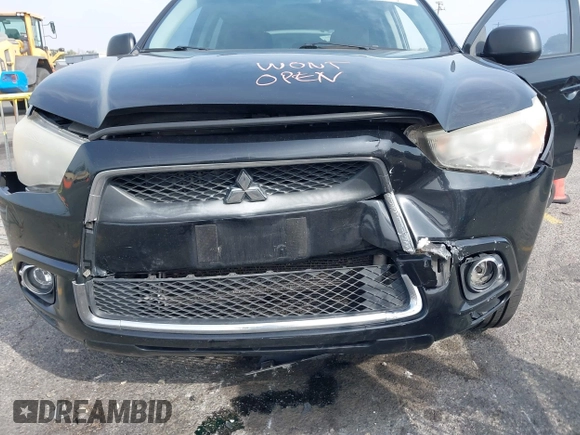 2012 Mitsubishi Outlander Sport SE with VIN JA4AP4AU6CZ000667, listed as a IAAI auction lot 41473935 with 195,414 mi miles. Bid and sale history available at carsss.com. Image 6.