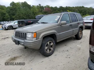 1997 Jeep Grand Cherokee Limited with VIN 1J4GZ78Y0VC599554, listed as a Copart auction lot 72006854 with 321,283 mi miles and Salvage Title. Bid and sale history available at carsss.com. Image 1.