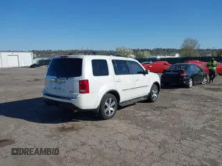 2012 Honda Pilot Touring with VIN 5FNYF4H98CB057659, listed as a IAAI auction lot 41927990 with 140,000 mi miles. Bid and sale history available at carsss.com. Image 4.