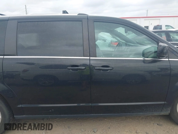 2018 Dodge Grand Caravan SXT with VIN 2C4RDGCGXJR283091, listed as a IAAI auction lot 41966553 with 102,309 mi miles and . Bid and sale history available at DreamBid. Image 13.