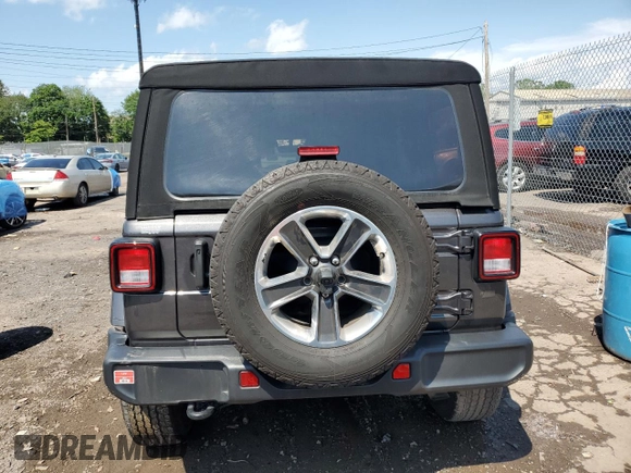 2022 Jeep Wrangler Unlimited Sahara with VIN 1C4HJXENXNW244773, listed as a Copart auction lot 59694095 with 21,871 mi miles and Salvage title. Bid and sale history available at DreamBid. Image 6.