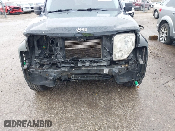 2012 Jeep Liberty Sport with VIN 1C4PJMAKXCW192564, listed as a IAAI auction lot 41948090 with 156,027 mi miles. Bid and sale history available at carsss.com. Image 6.