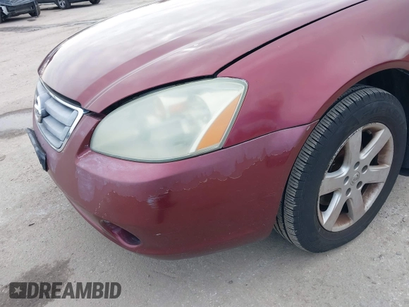 2002 Nissan Altima S with VIN 1N4AL11DX2C216559, listed as a IAAI auction lot 41540001 with 112,084 mi miles. Bid and sale history available at carsss.com. Image 15.