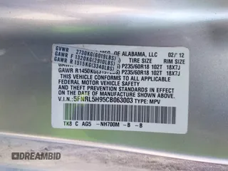 2012 Honda Odyssey Touring with VIN 5FNRL5H95CB063003, listed as a IAAI auction lot 41871975 with 179,332 mi miles and . Bid and sale history available at DreamBid. Image 9.