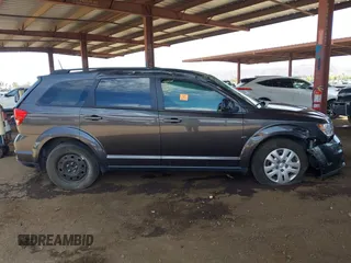 2019 Dodge Journey SE z VIN 3C4PDCBG9KT798938, wystawiony jako IAAI lot #42174970 z przebiegiem Nie podano mil oraz . Historia ofert i sprzedaży dostępna na DreamBid. Obrazek 12.