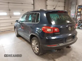 2011 Volkswagen Tiguan SE with VIN WVGBV7AXXBW533872, listed as a IAAI auction lot 40197835 with 104,685 mi miles and . Bid and sale history available at DreamBid. Image 3.