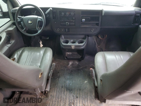 2014 Chevrolet Express Passenger 1LS with VIN 1GAZGZFAXE1105162, listed as a Copart auction lot 72773154 with 97,950 mi miles and Salvage title. Bid and sale history available at DreamBid. Image 8.