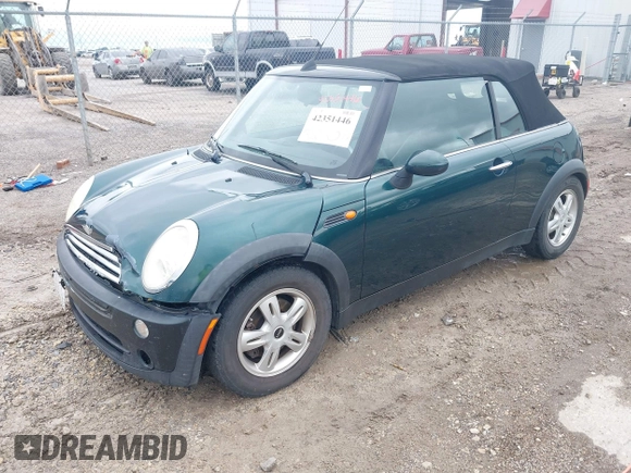 2005 MINI Convertible with VIN WMWRF33495TG11818, listed as a IAAI auction lot 42351446 with 100,033 mi miles and . Bid and sale history available at DreamBid. Image 2.