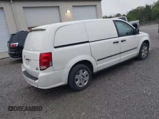2013 Ram Cargo Van Tradesman with VIN 2C4JRGAG9DR609436, listed as a IAAI auction lot 41965033 with 306,927 mi miles. Bid and sale history available at carsss.com. Image 4.