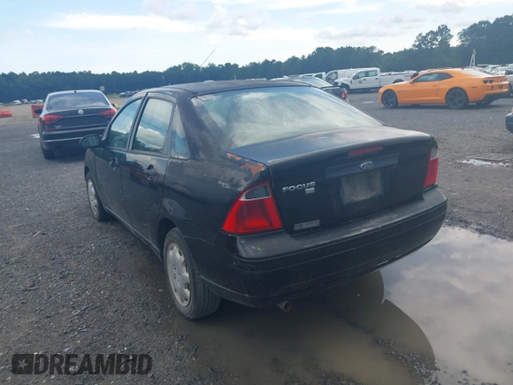 2007 Ford Focus S with VIN 1FAHP34N77W281443, listed as a IAAI auction lot 42693290 with 164,336 mi miles and . Bid and sale history available at DreamBid. Image 3.