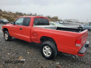 1998 Dodge Dakota SLT with VIN 1B7GG22X1WS598712, listed as a Copart auction lot 76095004 with 196,012 mi miles and Salvage Title. Bid and sale history available at carsss.com. Image 2.