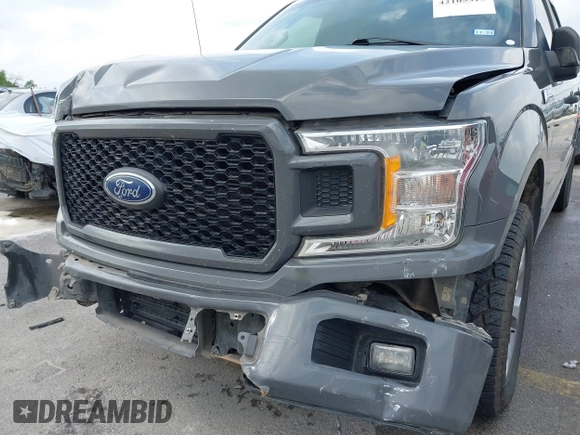 2018 Ford F-150 XL with VIN 1FTEW1EP4JFE22867, listed as a IAAI auction lot 42105313 with 185,175 mi miles and . Bid and sale history available at DreamBid. Image 6.