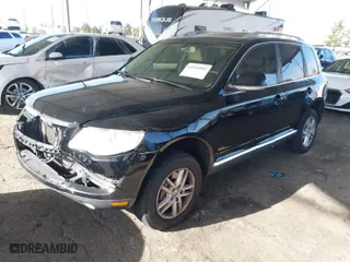 2008 Volkswagen Touareg 2 V6 with VIN WVGBE77L98D076917, listed as a IAAI auction lot 41934902 with 193,481 mi miles. Bid and sale history available at carsss.com. Image 2.