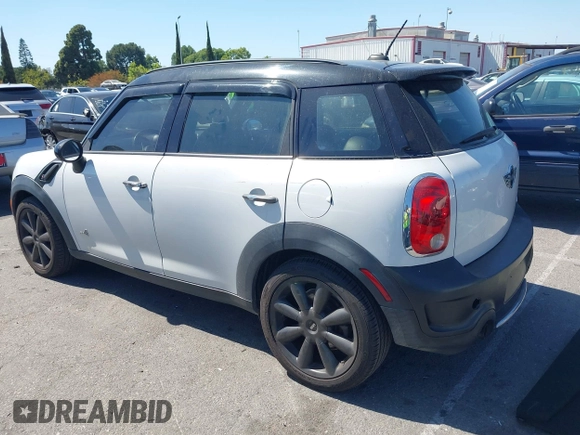 2012 MINI Countryman S with VIN WMWZC5C54CWM11869, listed as a IAAI auction lot 42265935 with 100,102 mi miles and . Bid and sale history available at DreamBid. Image 3.