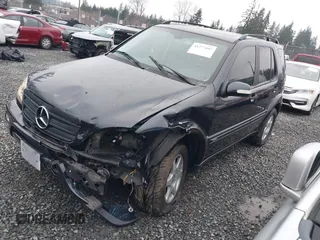2002 Mercedes-Benz M 320/430/500 z VIN 4JGAB54E72A296354, wystawiony jako IAAI lot #41277897 z przebiegiem 101 842 mil mil oraz . Historia ofert i sprzedaży dostępna na DreamBid. Obrazek 2.