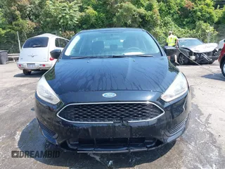 2016 Ford Focus S z VIN 1FADP3E26GL393235, wystawiony jako IAAI lot #42385660 z przebiegiem 133 049 mil mil oraz . Historia ofert i sprzedaży dostępna na DreamBid. Obrazek 13.