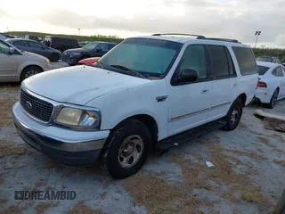 2000 Ford Expedition XLT with VIN 1FMRU1563YLA49729, listed as a IAAI auction lot 40613084 with 1 mi miles. Bid and sale history available at carsss.com. Image 2.