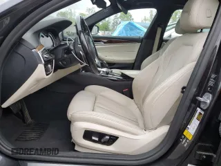 2018 BMW 5 Series 530i xDrive with VIN WBAJA7C5XJWC76816, listed as a Copart auction lot 52734405 with 77,917 mi miles and Clean Title. Bid and sale history available at carsss.com. Image 7.