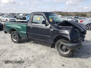 2000 Mazda B-Series 2WD Truck SX with VIN 4F4YR12V6YTM25960, listed as a Copart auction lot 43944095 with 140,980 mi miles and Salvage Title. Bid and sale history available at carsss.com. Image 4.