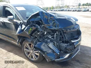 2020 Cadillac XT6 AWD Premium Luxury with VIN 1GYKPDRS0LZ101498, listed as a IAAI auction lot 40506360 with 46,920 mi miles and . Bid and sale history available at DreamBid. Image 6.